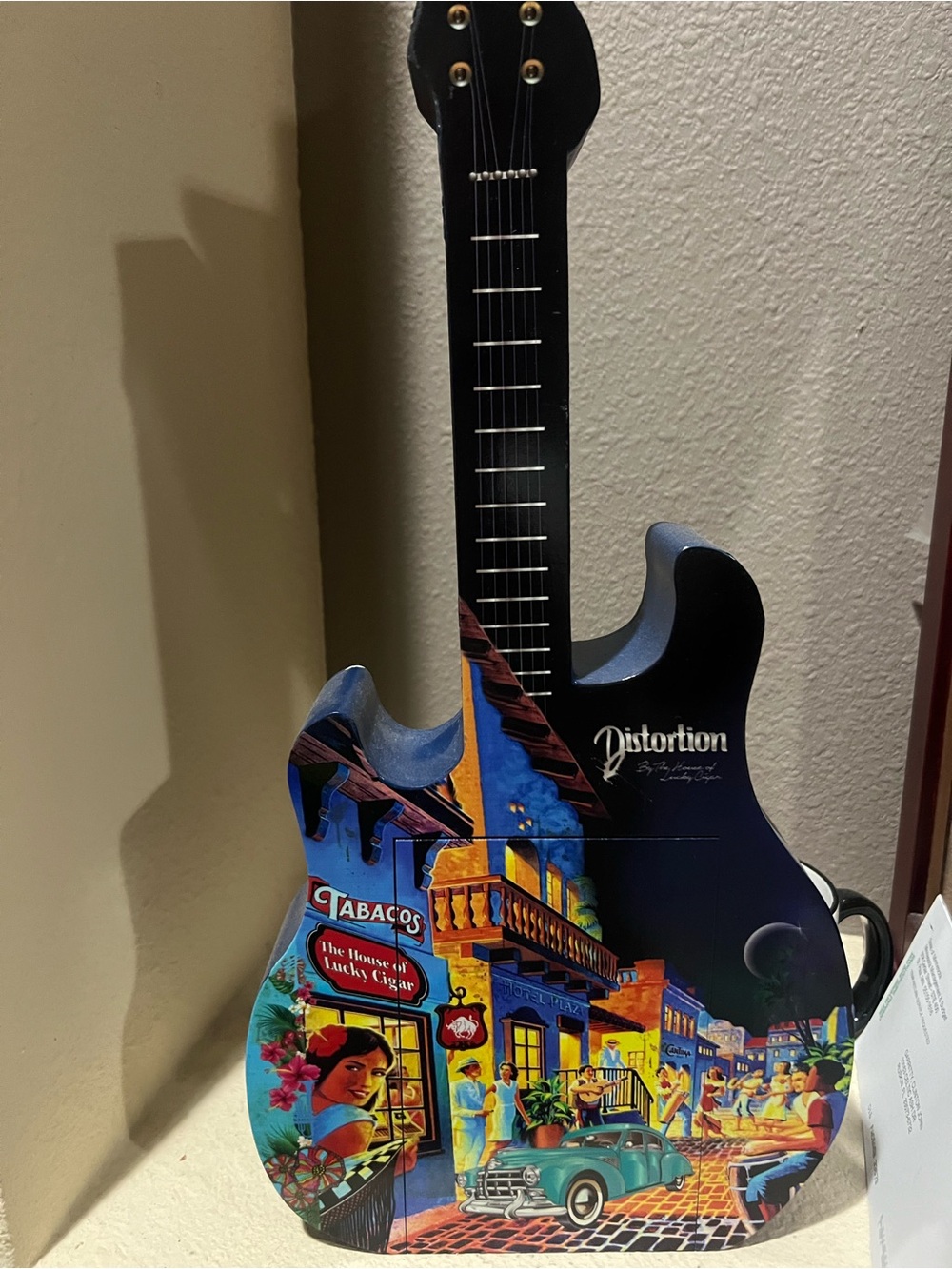 Cigar Guitar Shape Perfect For Storage As Well As Decor .